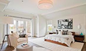 Above it is the tv lighted by wall lighting. 15 Dark Wood Flooring In Modern Bedroom Designs Home Design Lover