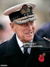Queen Elizabeth II and Prince Philip lay a wreath at the Sandringham...  News Photo