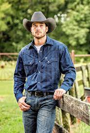 A person, especially in the western us, whose job is to take care of cattle, and who usually…. Hot Cowboy By Fence Hot Country Men Hot Cowboys Cowboy Outfits