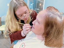 Students pamper residents at Derry Township senior facility with  Valentine's Day makeovers