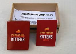 Try to get as many defuse cards as possible. Exploding Kittens Wikipedia