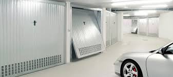 Le porte basculanti per garage possono avere diversi sistemi guida a seconda dell'edificio e dello spazio. Automazioni Per Porte Garage Faac Assistance Padova