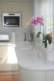 Compac Moon White Quartz Worktops With Cream Kitchen Cabinets Installed In Bromley Kent Kitchen Cupboards Paint Kitchen Renovation New Kitchen Cabinets