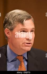 United States Senator Sheldon Whitehouse (Democrat of Rhode Island) walks  in the hallway during a break in the testimony of Dr. Christine Blasey Ford  before the US Senate Committee