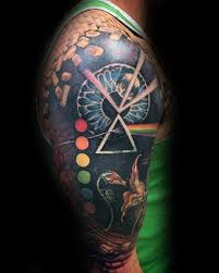 Fire is almost always associated with gods and magic, and fire tattoos often reflects this. 80 Pink Floyd Tattoos For Men Rock Band Design Ideas