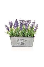 Comfortable garden bench is a nice addition to the patio or sunroom. Artificial Silk Lavender Display Is Metal Trough Just Artificial