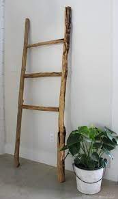 6ft ladders, barn wood decorations, greenery garland, rustic wood decorations, rustic wood displays, best wooden ladders for display. Rustic Wooden Blanket Ladder For Free Domestic Imperfection