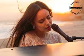 Purple Hearts' star Sofia Carson gives beach performance for 'Come Back  Home' music video