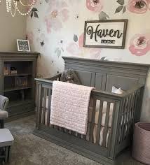 The background walls are soft grey, which contrasts nicely with the white crib. Pin On Floral Nursery Designs