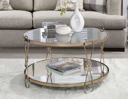 Check out our mirror coffee table selection for the very best in unique or custom, handmade pieces from our coffee & end tables shops. Zekera Champagne Finish Round Mirrored Top Coffee Table