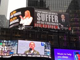 It features the line  staying home means saving lives . Lincoln Project Targets Ivanka And Jared For Covid 19 Death Count With Massive Times Square Billboards The Independent