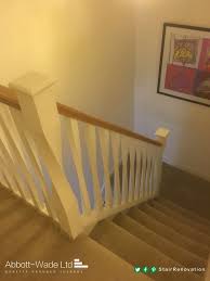 The hardwood floor that covered almost the entire oak railings white spindles to either copper or bronze iron balusters. White Twisted Newel Posts Spindles With Oak Handrail Staircase Cheshire By Abbott Wade Ltd Houzz Uk