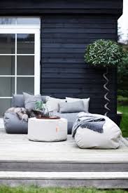 This Outdoor Furniture Collection Is Made Of Bean Bag Chairs Cushions Ottomans And Outdoor Space Design Outdoor Furniture Collections Trendy Interior Design