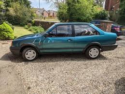 Image result for Dark Polo Green 1991 Seville