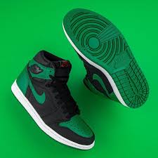 Jordan 1 Low White Lucky Green Black Stadium Goods On Instagram For Its Latest Hit Jordan Brand Graces The Air Jordan 1 With A Little Luck Of The Iris In 2020 Air Jordans Popular Sneakers Sneaker Head