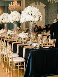Junior League Of Houston Wedding Venue Navy Tablecloths With Tall White And Blush Arrangeme Navy Blue And Gold Wedding Wedding Venue Houston Blue Gold Wedding