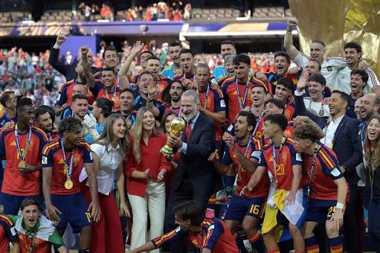 Spanish players lift the trophy and celebrate winning the 2026 World Cup  football tournament final match between Spain and Argentina at the New  York/New Jersey Stadium in East Rutherford on July 19,