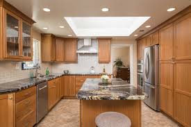 Kitchen cabinets drive the design, look and functionality of the rest of a kitchen. John Deluca Designed This Kitchen In Ramona California With Starmark Cabinetry S Bridgeport Door Style Kitchen Remodel Kitchen Cabinet Colors Custom Kitchens