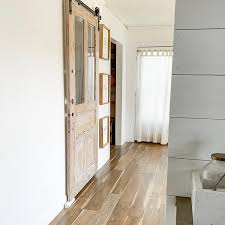 But in my heart i always longed for a farmhouse laundry room. Farmhouse Laundry Room Update A 200 Year Old Farmhouse Door On A Barn Door Track A Diy Crate Storage Folding Shelf We Lived Happily Ever After