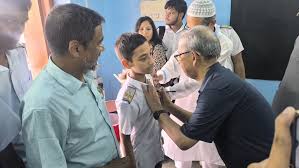Reception of The founder Chairman Dr. Abu Zakaria at Naogaon Krishnadhan  (KD) Govt High School for the German “Federal Cross of Merit” Award