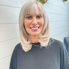 After the alleged infidelity of her husband became very public Kim Pothier  has went back to her maiden name and taken the reigns of the church. The  name of the church is