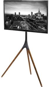 The adjustable leg that allows easy placement on uneven surfaces. Top 10 Tv Stands With Tripod Leg