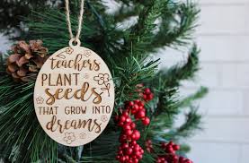 Christmas tree, live or artificial evergreen tree decorated with lights and ornaments as a part of while christmas trees are traditionally associated with christian symbolism, their modern use is. Christmas Ornament Teacher Gift Teachers Plant Seeds That Grow Etsy In 2020 Christmas Plants Gifts Teacher Ornaments Teacher Gifts