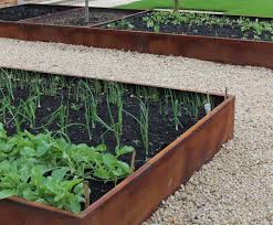 Birdies are the original metal raised garden bed and are the #1 best selling bed in australia, now available here in the usa! Corten Steel Finish Planters For Award Winning Garden Livingreen Design Esi External Works