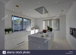 island unit in modern white kitchen