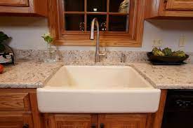 I have some high gloss flat panel maple cabinets that i want to paint black, how do i prepare them to be ready to. Benjamin Moore Revere Pewter In The Kitchen With Oak Cabinets Revere Pewter Also Looks Great With Cherry Ma Painting Oak Cabinets Oak Cabinets Maple Cabinets