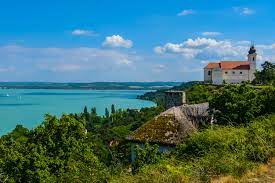 The most popular beach and resort area in hungary, the huge freshwater lake and it's surrounding is a perfect place to relax. The Abbey Of Tihany And Lake Balaton Hungary Europe