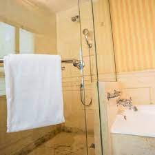 Bathroom glass cleaning takes a little more effort because soap scum tends to accumulate over it, creating a waxy film that's difficult to scrub. Ultimate Diy Guide To Cleaning Shower Doors Merry Maids