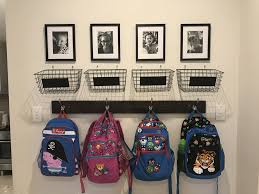 School Bag Storage Baskets From Kmart For School Notes And A Photo Above Each Hook Total Cost 50 School Bag Storage School Bags For Kids Bag Storage