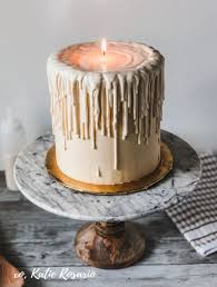 7 Christmas Cake Ideas That Ll Be Your New Holiday Obsession Katie Rosario In 2020 Melted Candle Cake Candle Cake Chocolate Candy Melts