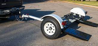 We offer tow dolly rental and car carrier rental options to make moving your vehicle safe and easy. How To Tow A Car Using A Tow Dolly Blog