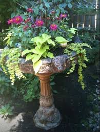 20 Amazing Diy Outdoor Planter Ideas To Make Your Garden Wonderful Diy Planters Outdoor Garden Containers Bird Bath Planter
