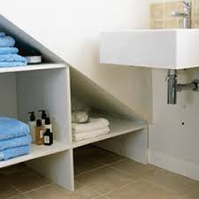 Thick boxes create open and unusual storage in the space above the toilet. Bathroom Storage Ideas Small Bathroom Space Savers