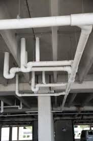 How To Cover Unsightly Low Ceiling Pipes In A Basement Hunker Basement Ceiling Low Ceiling Basement Basement Ceiling Ideas Cheap