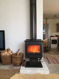 Scandia Warmbrite 140 Wood Heater Was Installed Today Walls Are Painted White Carpet Is Ripped Up To Reveal Industrial Looking C Wood Heater Holly House Wood