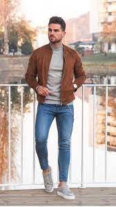 Men S Tobacco Suede Bomber Jacket Grey Turtleneck Blue Skinny Jeans Grey Suede Low Top Sneakers Mens Casual Outfits Summer Winter Outfits Men Mens Casual Outfits