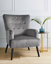 The sculpted dining chairs in this modern minimalist black and white dining room have a certain 1980s recommended reading: Flynn Accent Chair Oxendales
