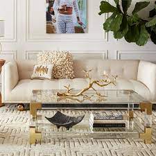 It can be used as a coffee table or as a side table. Elegant Glass Made Golden Finish Coffee Table My Aashis