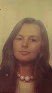 This photo is 70 years old,I'm the littlest girl with my mother if it could  be coloured and brought into focus I would be very happy thank you.X