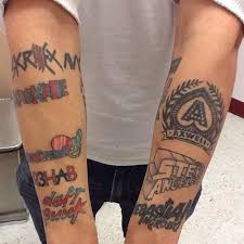 Classic logo pattern skate deck. Nine Impressive Edm Tattoos