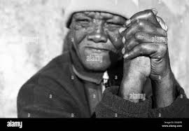 Poverty hands Black and White Stock Photos & Images