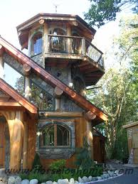 Our post and beam home kits enable large volumes and open floor plans while maintaining a timber aesthetics and scale. Post And Beam Tower Gorgeous Rock Work And Log Work Log Homes Rustic House House Exterior