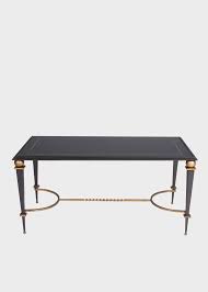 A lovely danish design coffee table made of beautiful quality rattan with a blurred glass top. French Mid Century Black And Gold Coffee Table 1950s Paul Smith Us