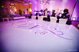 White Dance Floor With Name Projection And Lounge Chairs Dance Floor Wedding Wedding Dance Wedding Inside