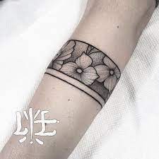 I made a couple of vintage floral patterns today! I Love These Simple Floral Cuffs Almost Like Wearing A Bracelet Blackwork Blackworkerssubmission Btattooing Black Cuff Tattoo Arm Band Tattoo Band Tattoo
