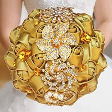 Wedding bouquet of carnations and roses will beelegant accessory in the hands of the newlywed. Amazon Com Gold Rhinestone Brooch Wedding Flowers Bridal Bouquets Golden Crystal Bride Holding Bouquet Bridesmaids Bouquet Satin Roses With Crystal Diamond Pearl Decor Dia 8 26inchh 10inch Gold Color W227q Kitchen Dining